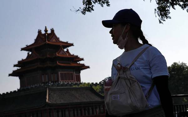 Χωρίς μάσκες σε εξωτερικούς χώρους οι κάτοικοι του Πεκίνου, κανένα κρούσμα για 13η μέρα