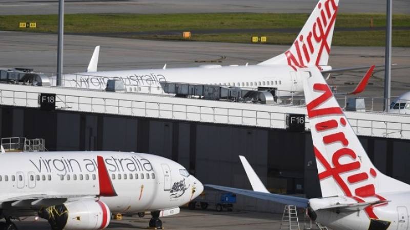 Πρώτη κατάρρευση αεροπορικής λόγω πανδημίας: Στάση πληρωμών στη Virgin Australia